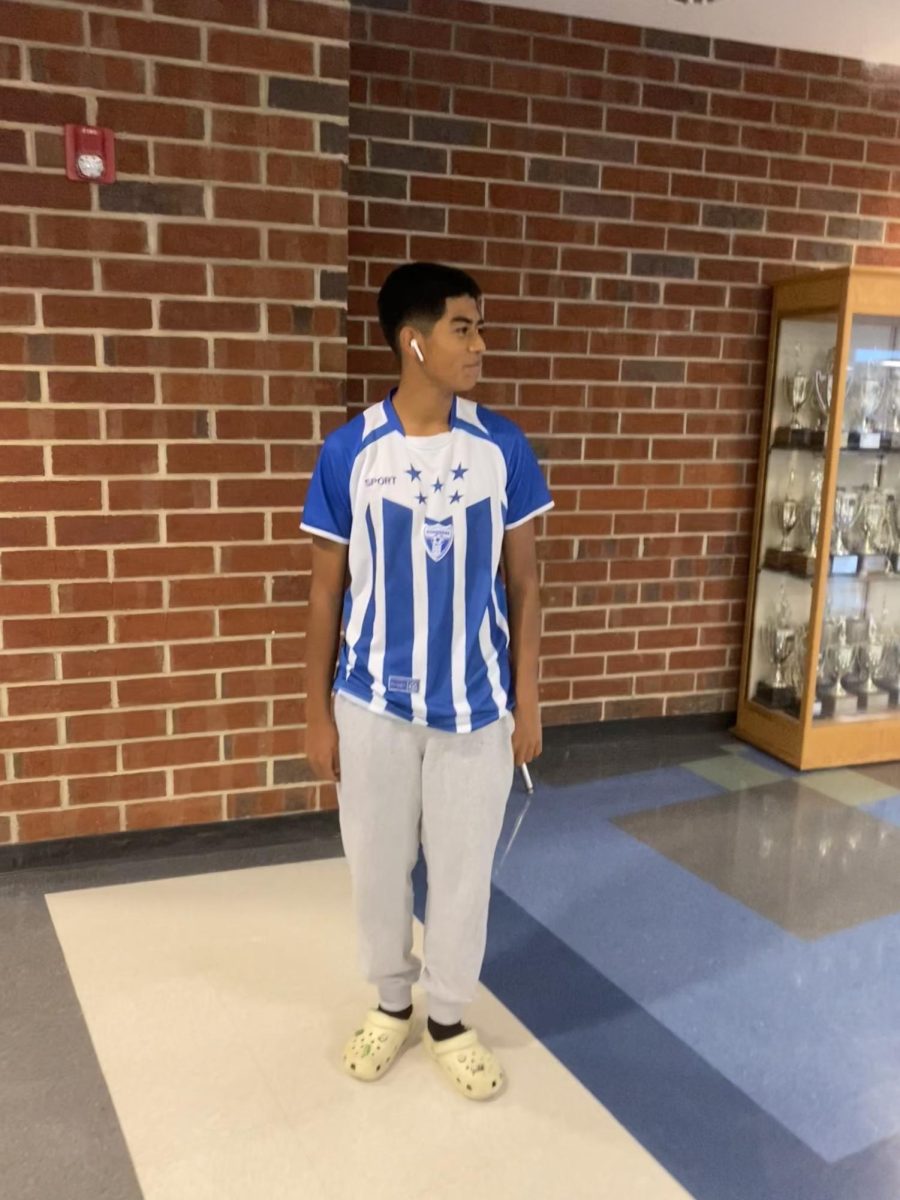 Freshman, Jonathan Ortega wearing his jersey for jersey day.