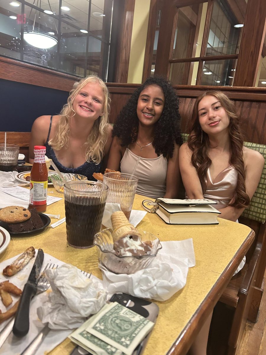 Sophomore Liva Jwanmery, Rekik Zelalem and Junior  Madison Keller went out to Wood Grill to eat before going to homecoming. 