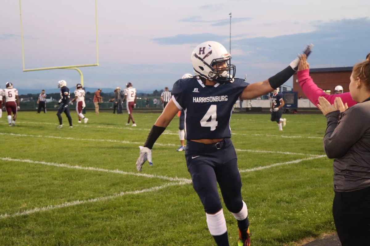 Freshman Keyon Benton celebrates after scoring a point