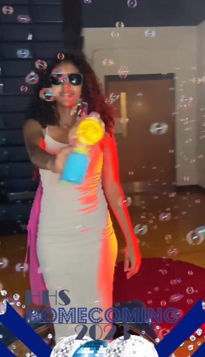 Sophomore Rekik Zelalem, participates in a 360 spinning video at homecoming. 