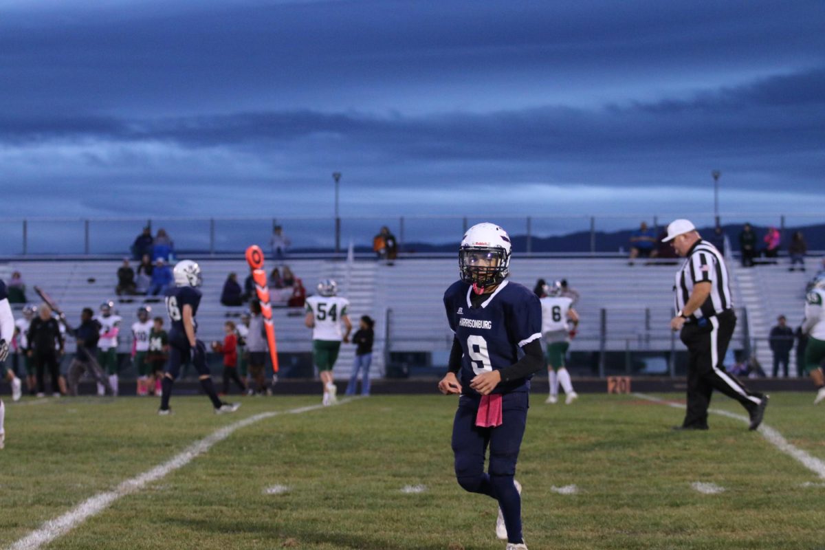  Freshman Santana Perry coming off of the field to talk to the coach 