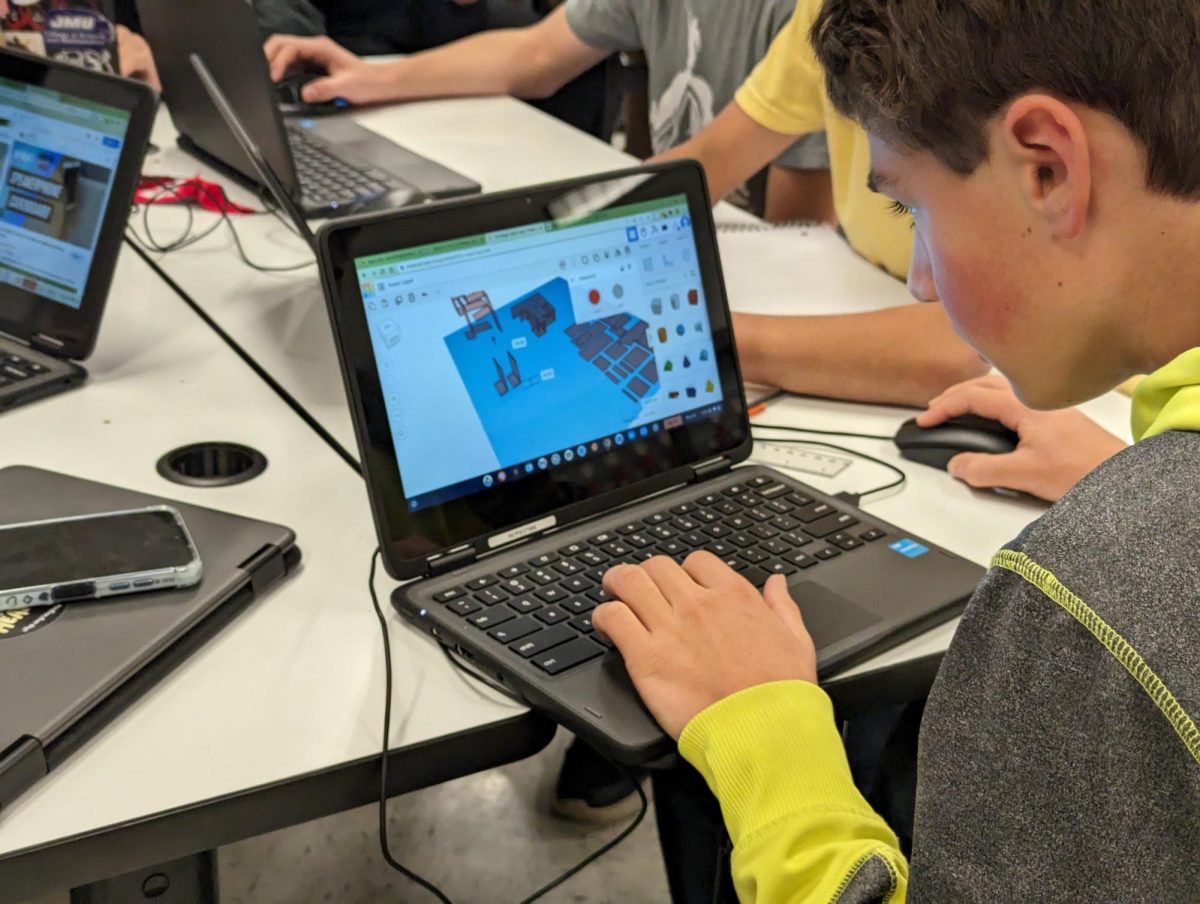 Josiah Nafziger is working on a digital design.

