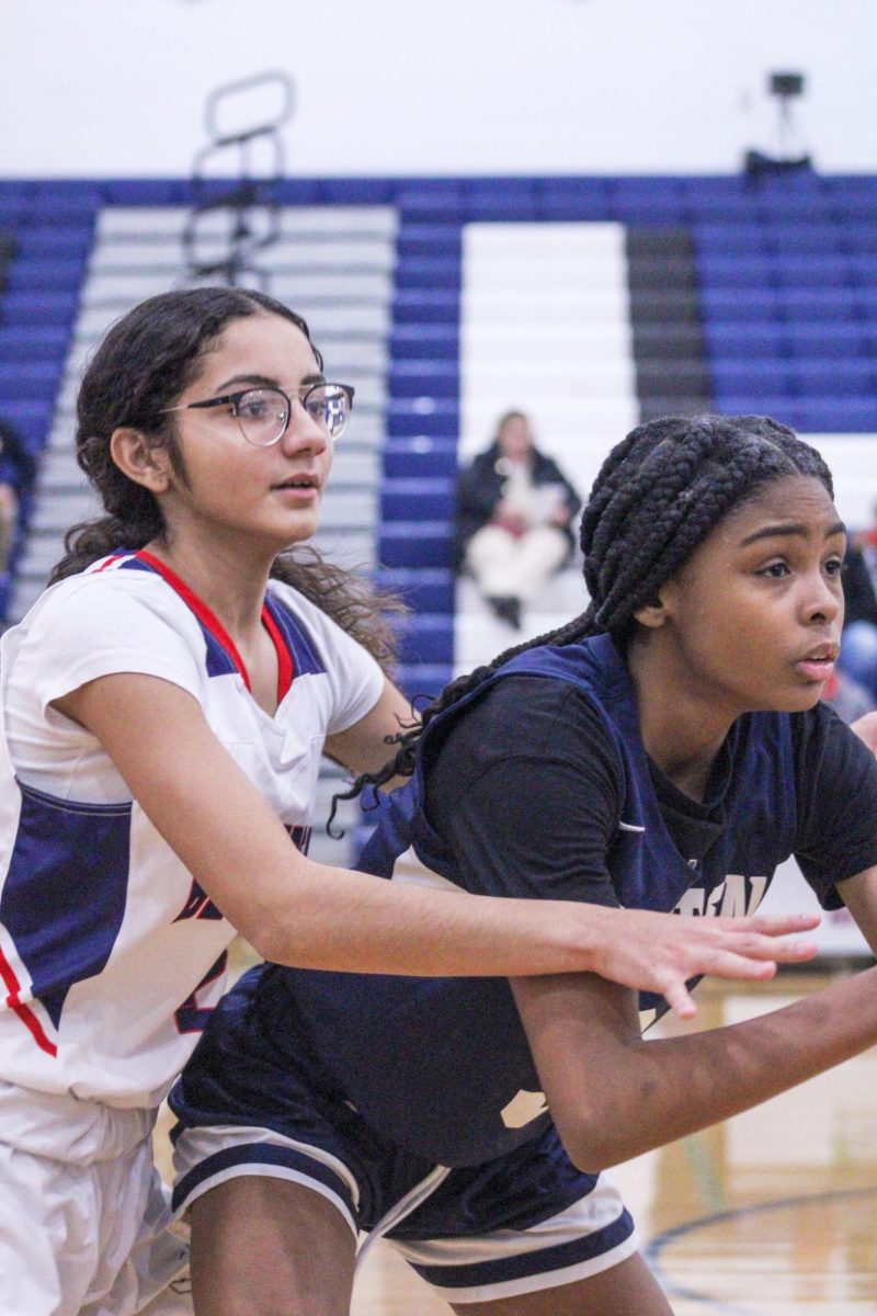 Freshman Nayeli Amaya Olivencia stays on her opponent. 