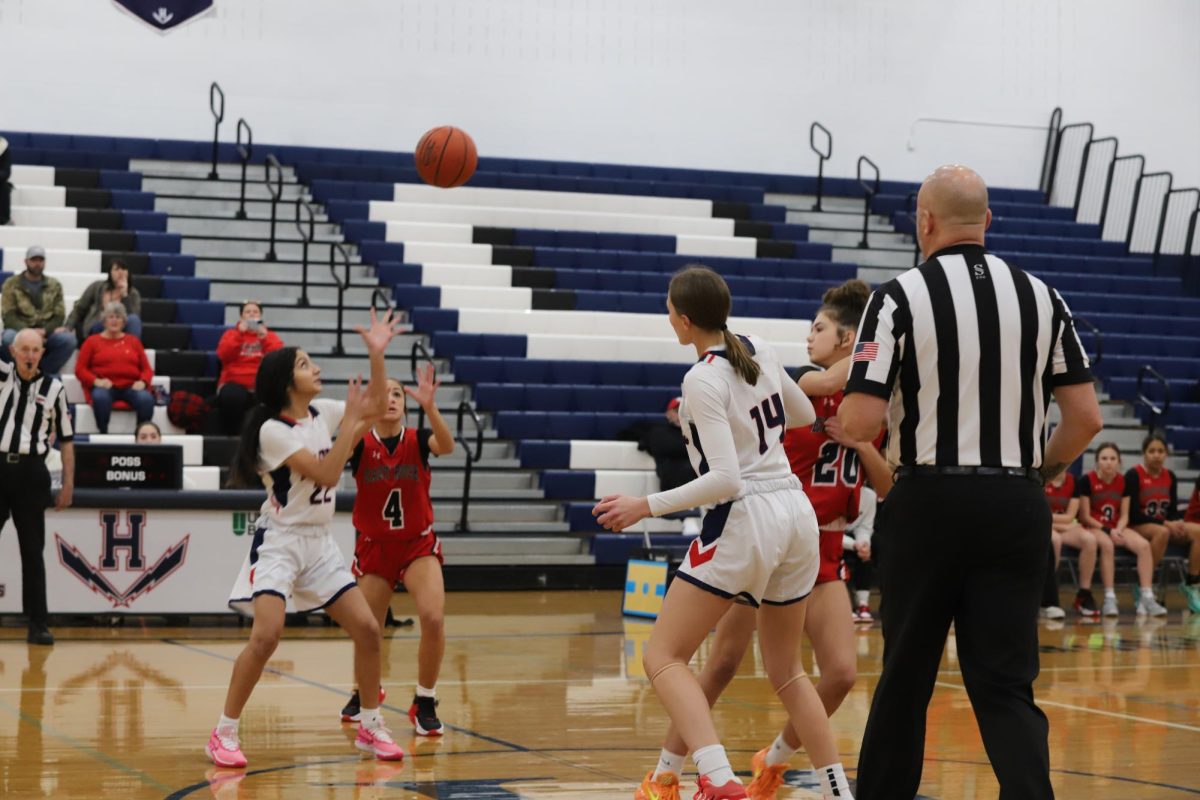 Freshman Nayeli Amaya attempts to retrieve the ball.  