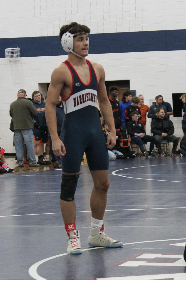 Freshman Jeriel Herrera waits for his opponent to be set at the beginning of the second period.