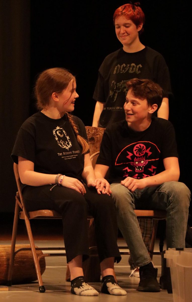 Freshman Elliot Norment sits next to junior Reese Tibbles in the competition one act play.