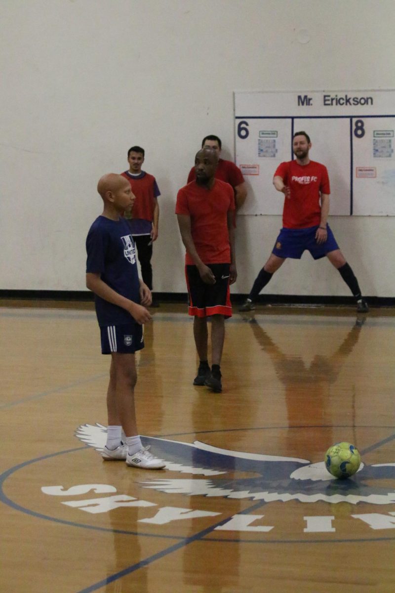 Sophomore Joshua Osei prepares for a penalty kick.
