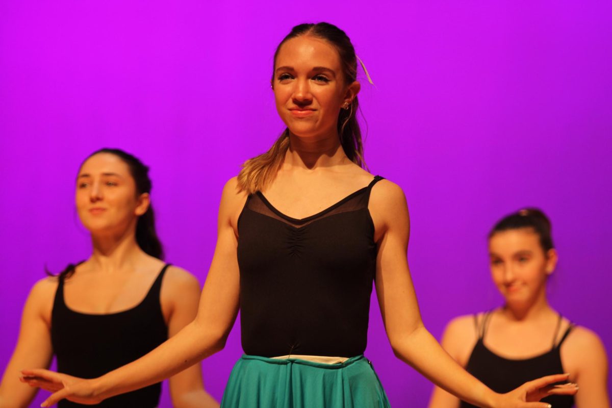 Student in the HHS dance program performs a dance to Christmas carol named Carol of the Bells.
