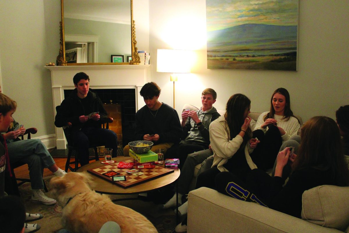 HHS Varsity swim team plays games during swim team dinner. 