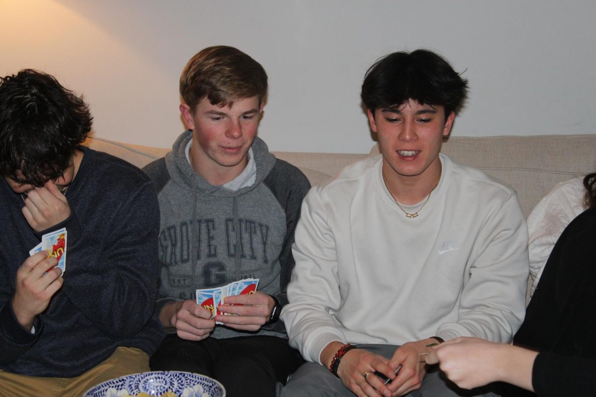 Senior Julien Steines and junior Paul Tongen watch the game unfold. 