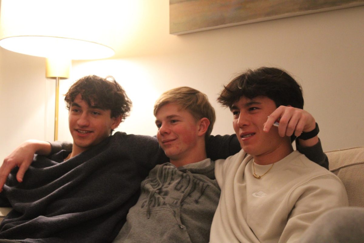 Senior Julien Steines, junior Paul Tongen, and sophomore Albert Krashenninikov talk about their upcoming swim meet. 