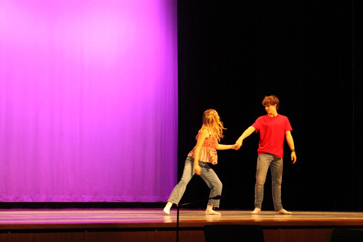 Sophomore Billy Perrit  An Sophomore Abby Gibson holding hands 