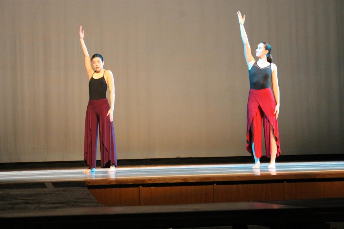Senior Jade Chao and Elsie Corston dance Chao's piece entitle "Bloom"