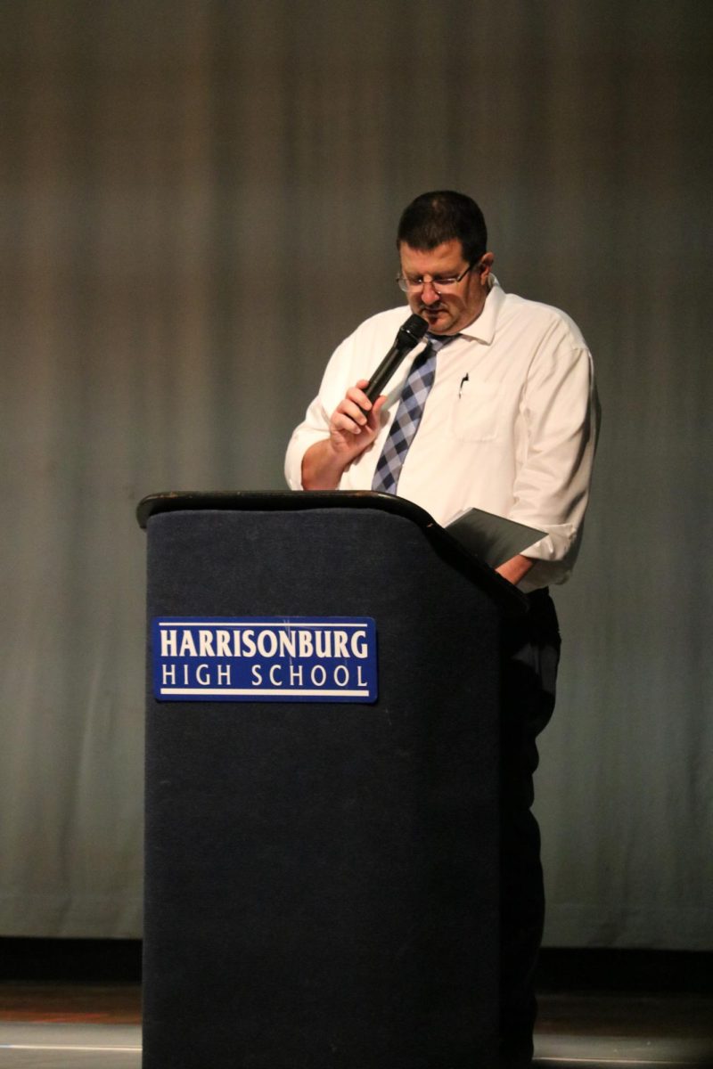 Brandon Burley opens the fall sports awards. 