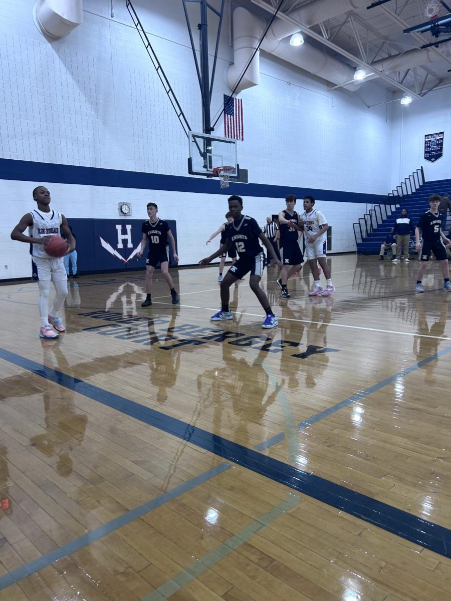 Freshman Kenyon Benton prepares to pass the ball to a teammate.