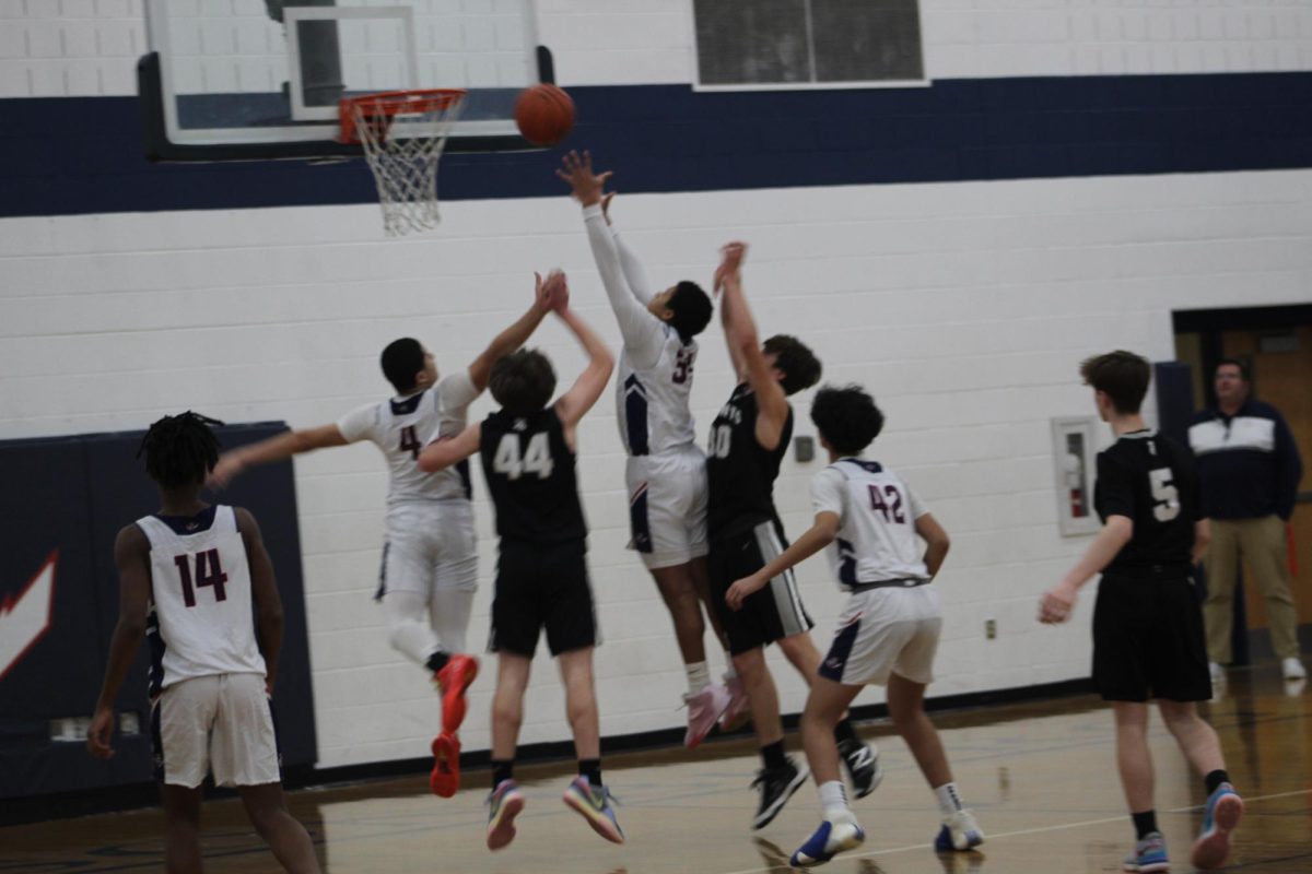 Freshman Demetrius Arrington attempts to overtake the ball.
