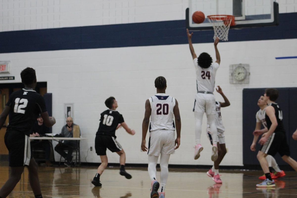 Freshman Ayden Gordon attempts to shoot the ball. 
