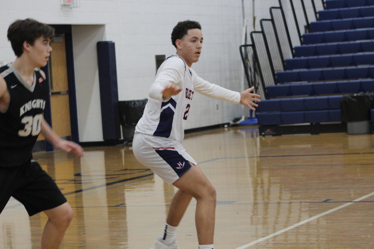 Sophomore Xavier Banks Prepares to defend. 