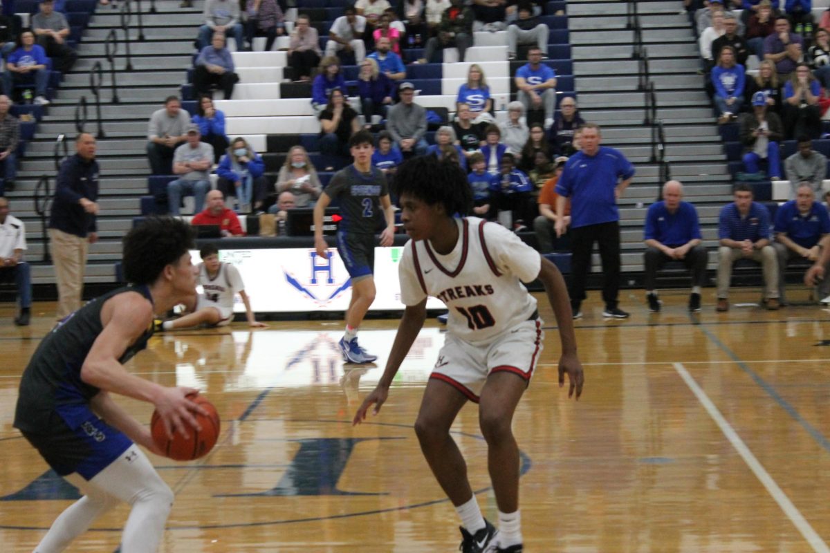 Junior Latham Fields prepares to defend. 