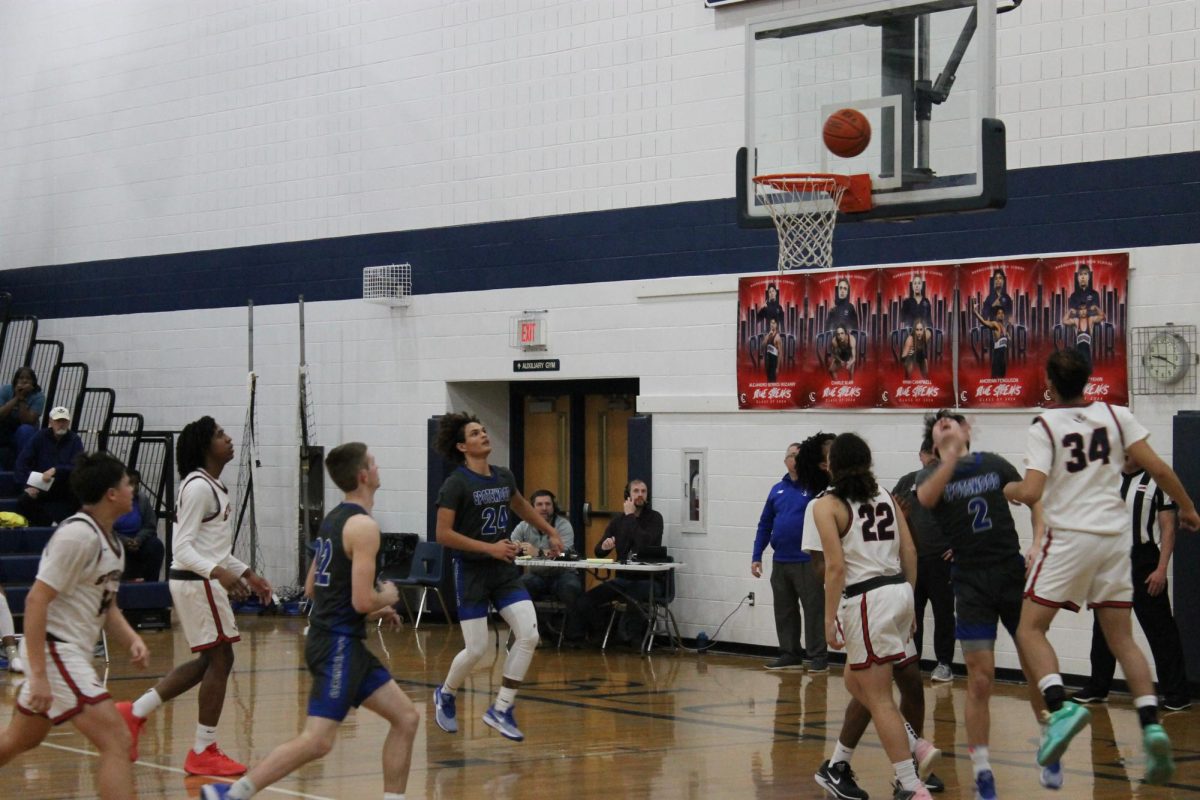 Junior Camden Teter gets ready to catch the ball. 