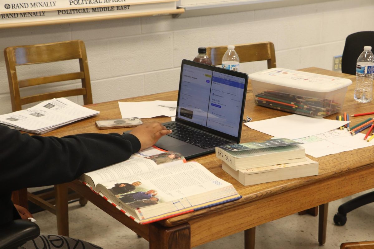 Student works on homework in On The Road Study Hall