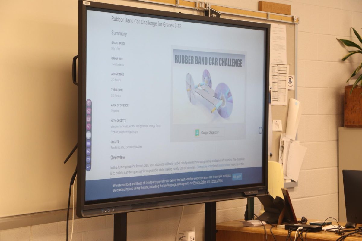 Newline board presents rubber band car STEM project directions