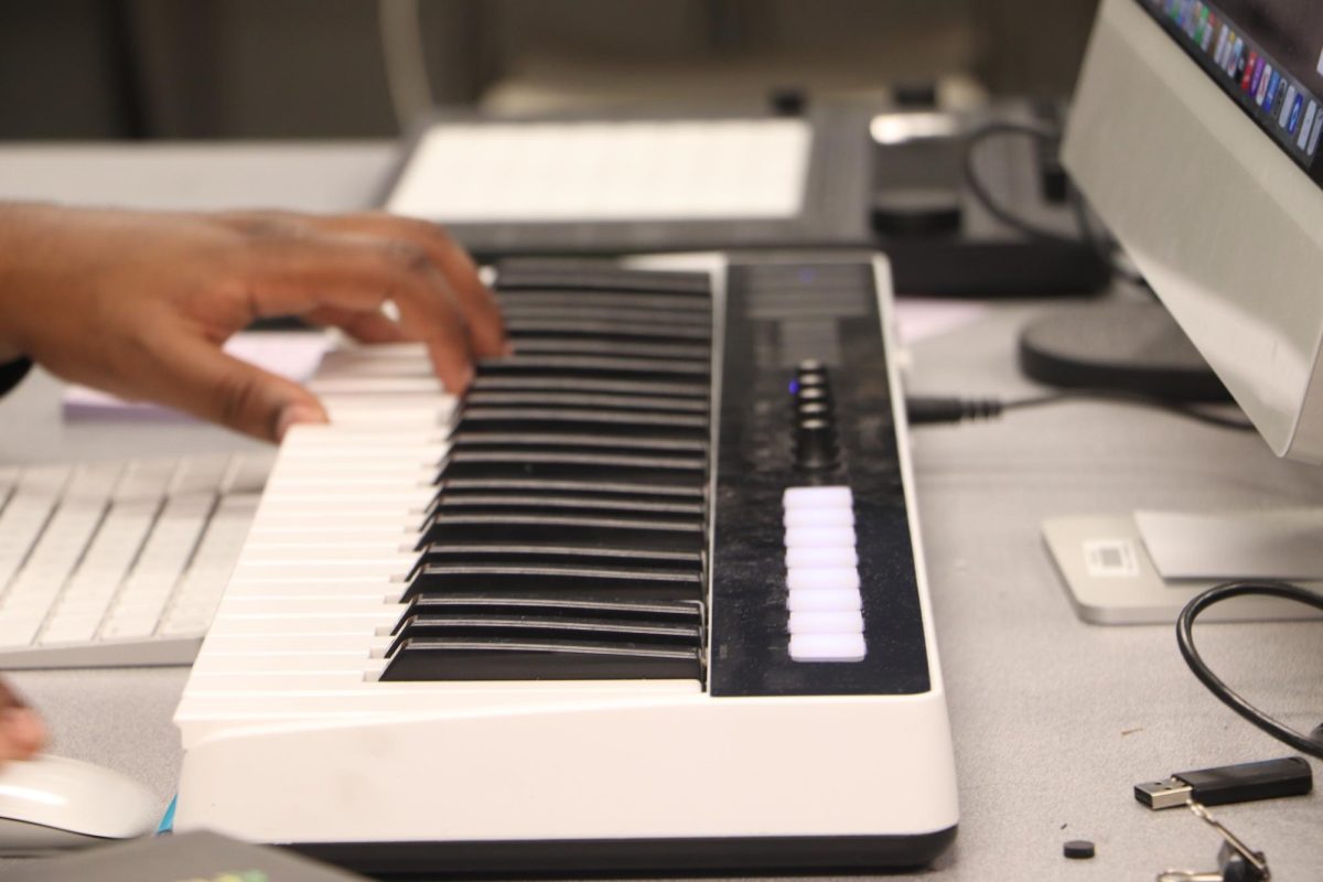 Diamanté Patterson plays with MIDI keyboard.