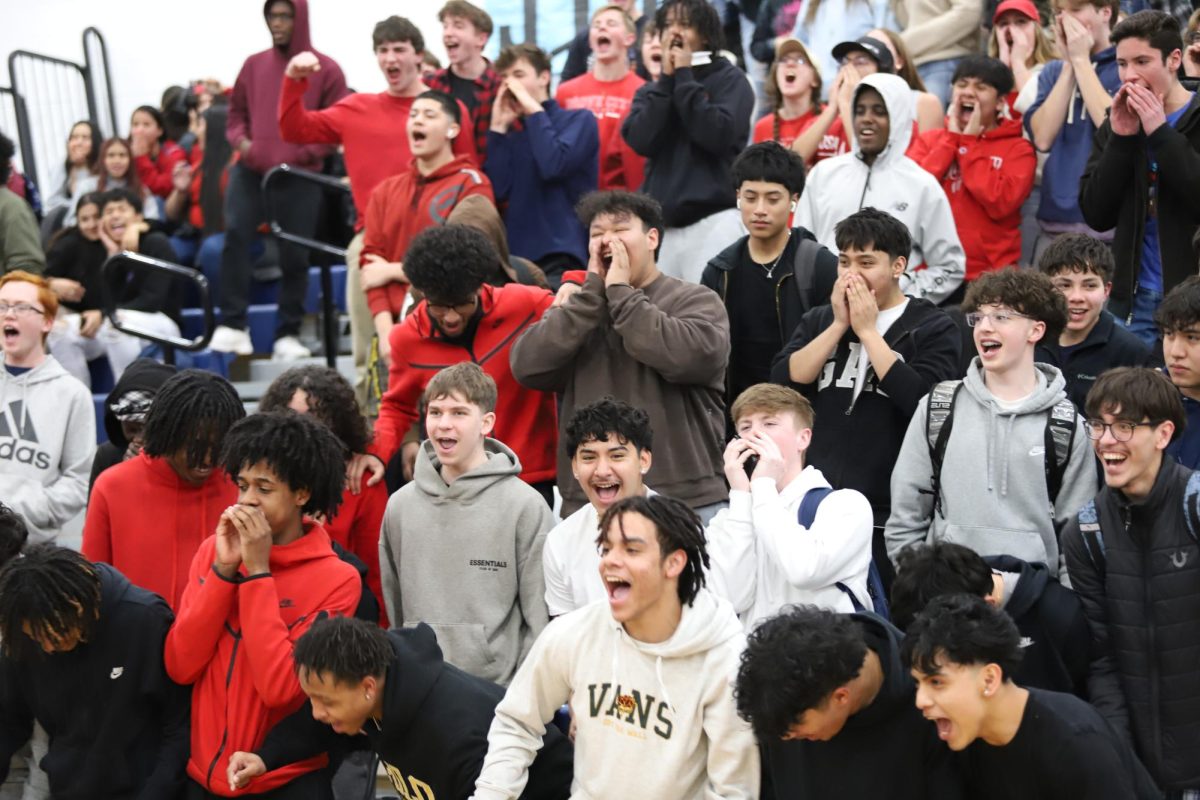 Junior class makes noise in noise making competition between classes. 