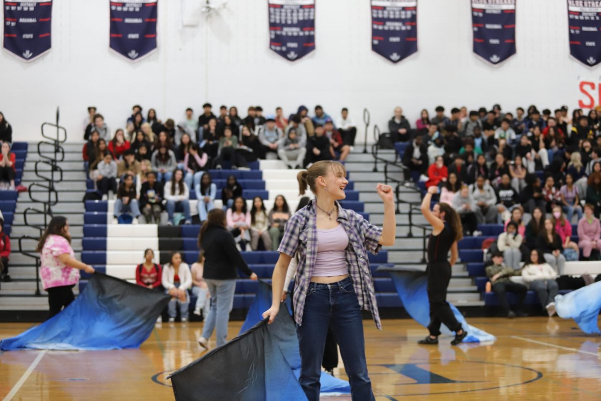 Color guard starts off the pep rally with a performance. 