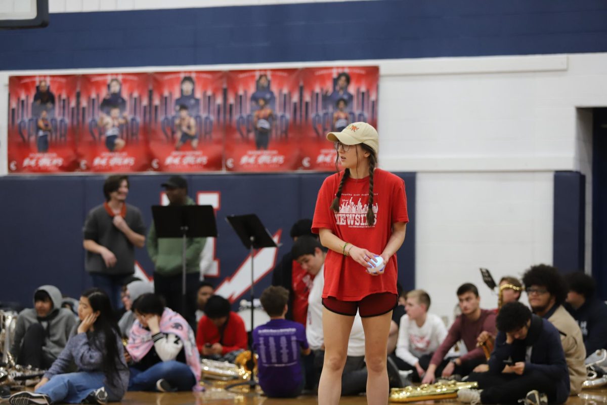 Junior Lydia King represents her class in a guess the song competition. 