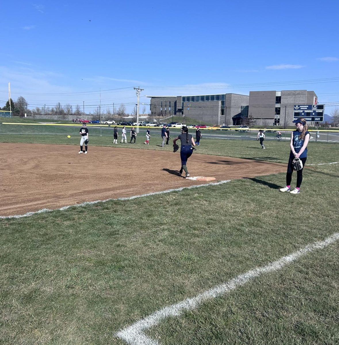 Sophomore Amy Matamoros catches a ball at first base.