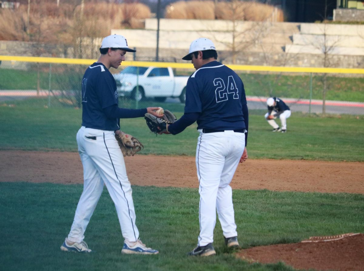 Sophomore Xavier Banks give the ball back to Freshman Xavier Ruvalcaba. 