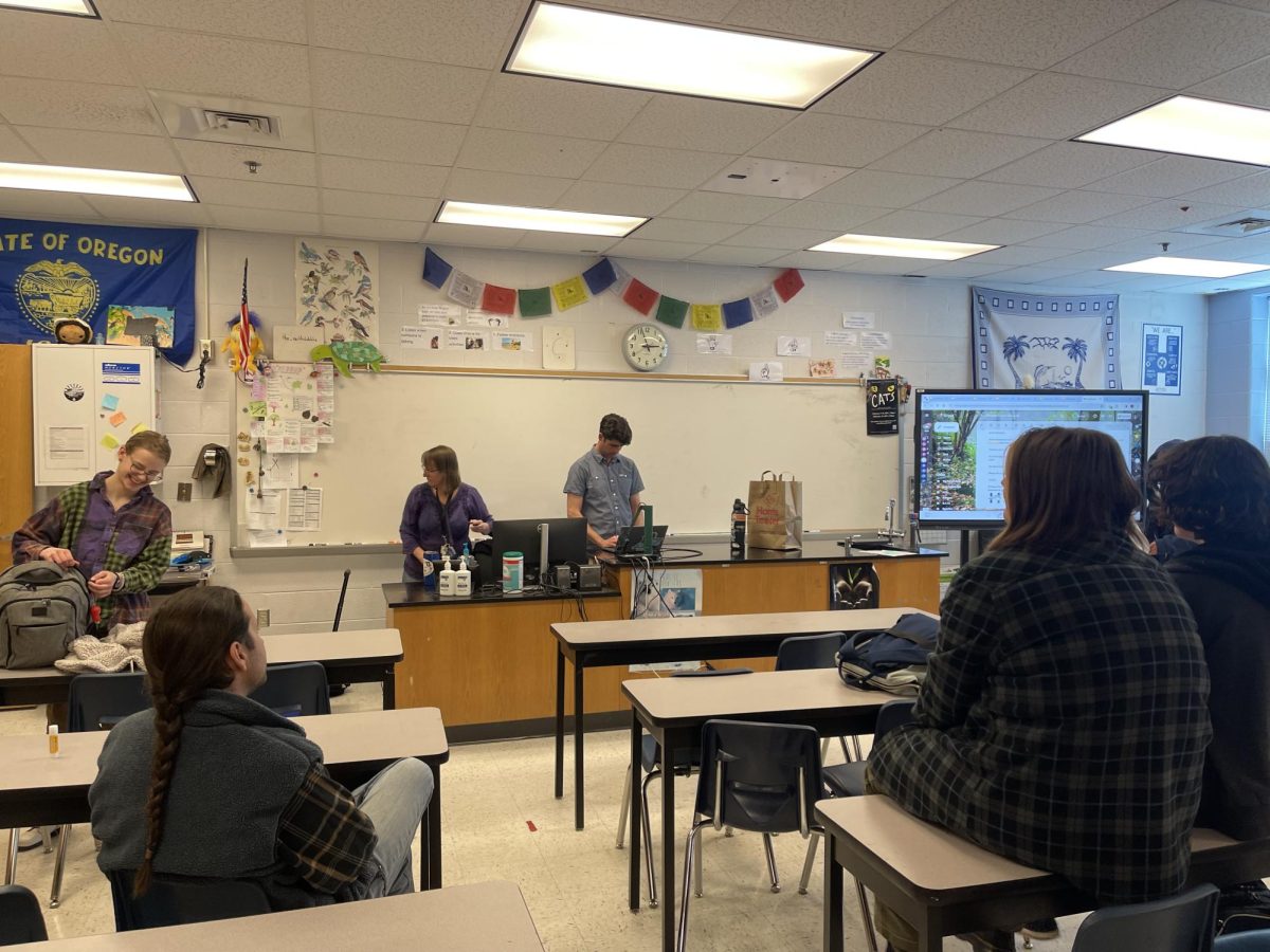 Earth Club members getting ready to start the meeting.