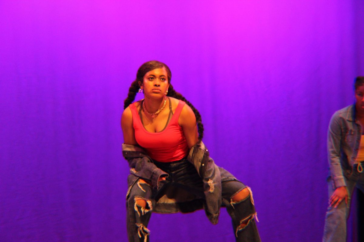 Sophomore Linda Hamilton performs in a trio dance piece.