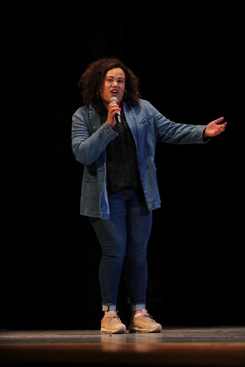 Black Student Union sponsor Cedrice Kenney-Moyer gives remarks at the conclusion of the nights performances.