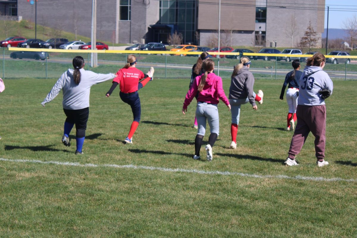 Jv girls softball stretches for warmups. 