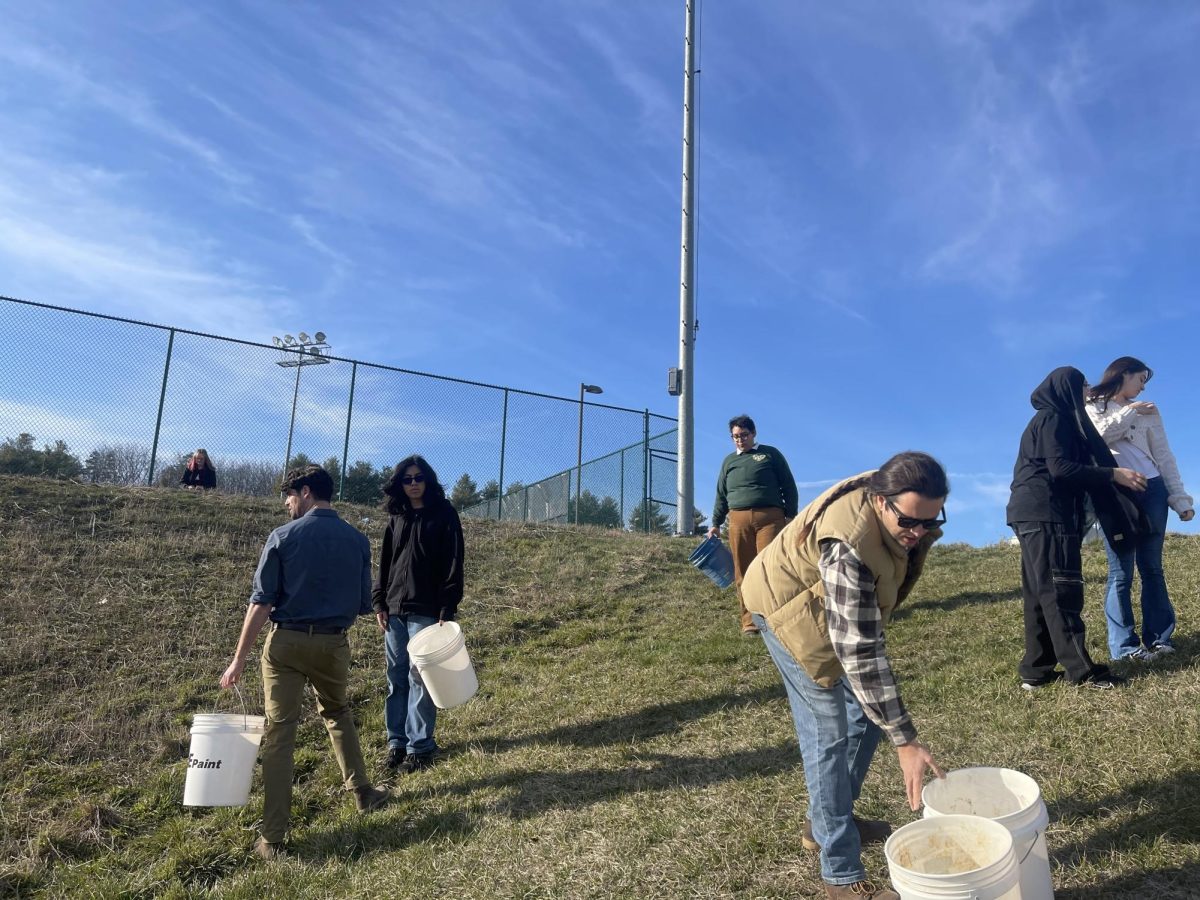 Members checking if everyone has emptied out their buckets.