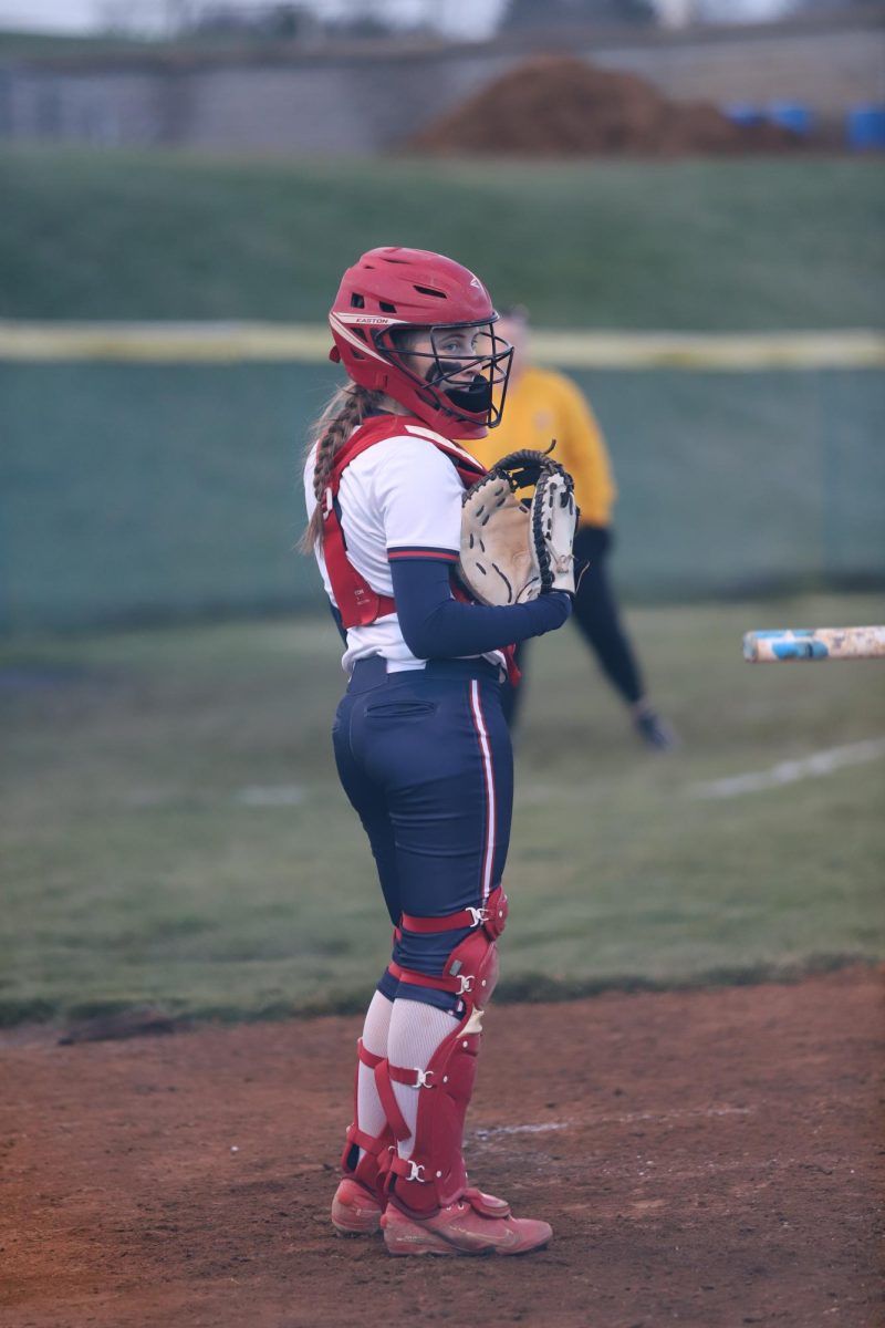 Junior Mckenna Dayton prepares to go up to catch.
