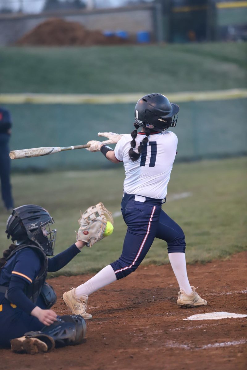 Senior Idaly Alvarez swings at a pitch.