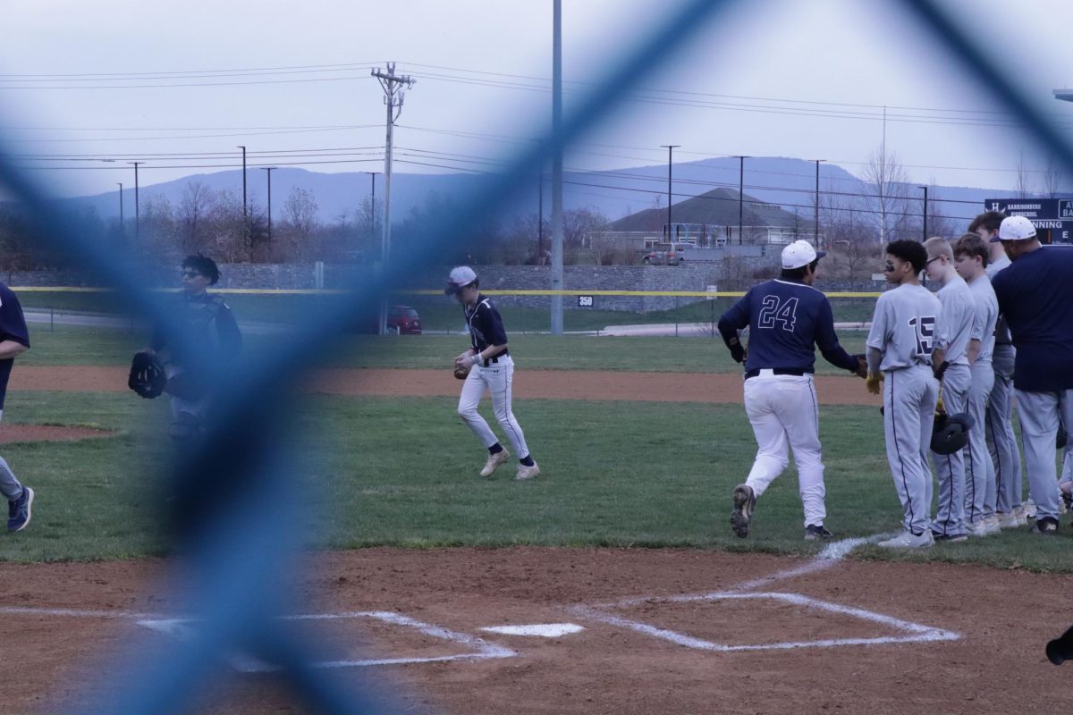 HHS JV baseball players hand shaking Staunton High School players.
