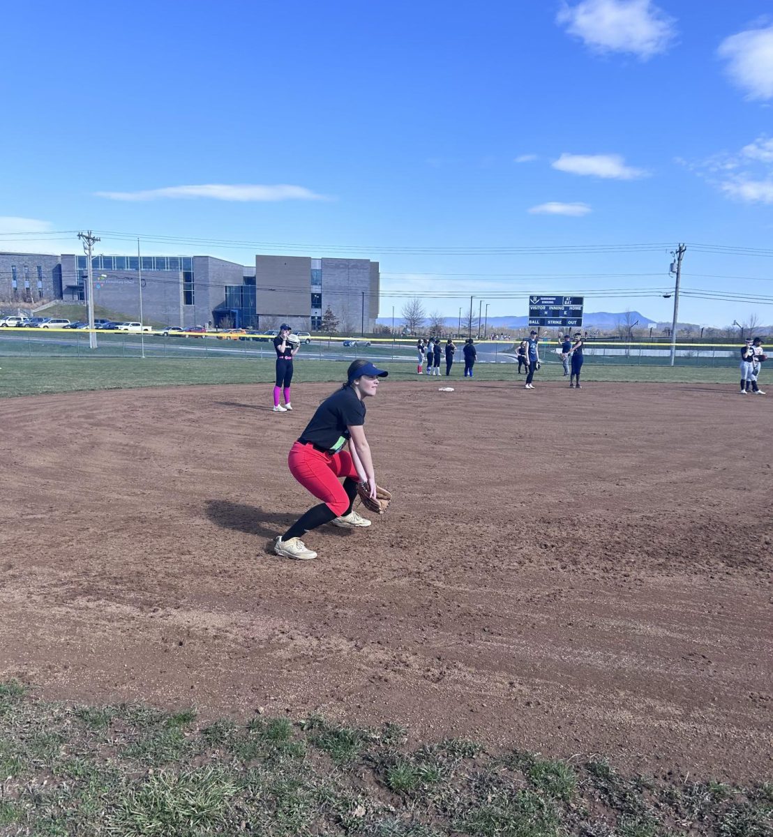 Freshman Jordyn Byler prepares to catch a grounder at third base.