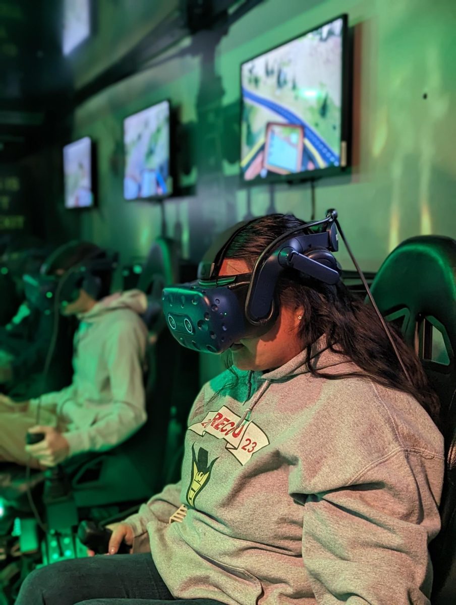 Another JROTC student playing in the VR set. The simulation was supposed to imitate being in a helicopter and trying to stop the California wild fires.   