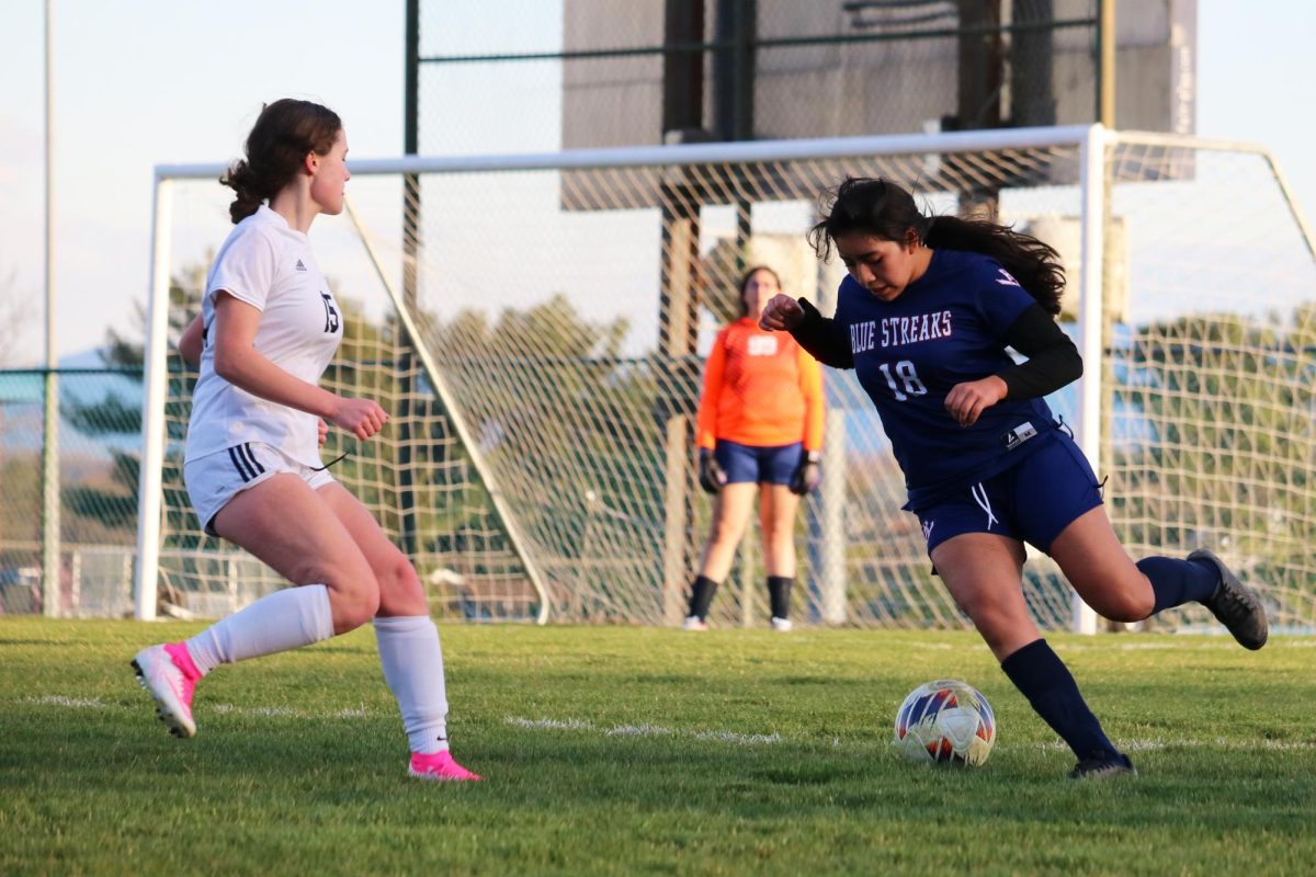 Sophomore Monica Cruz Gonzalez gets ready to pass the ball to a teammate. 