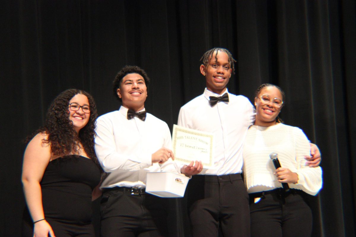 BSU hosts congratulate Seniors VJ Bullard and Zachary James for winning showstopper of the night.