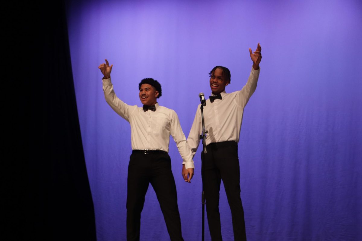 Seniors Zachary James and VJ Bullard perform a song during the BSU talent show.