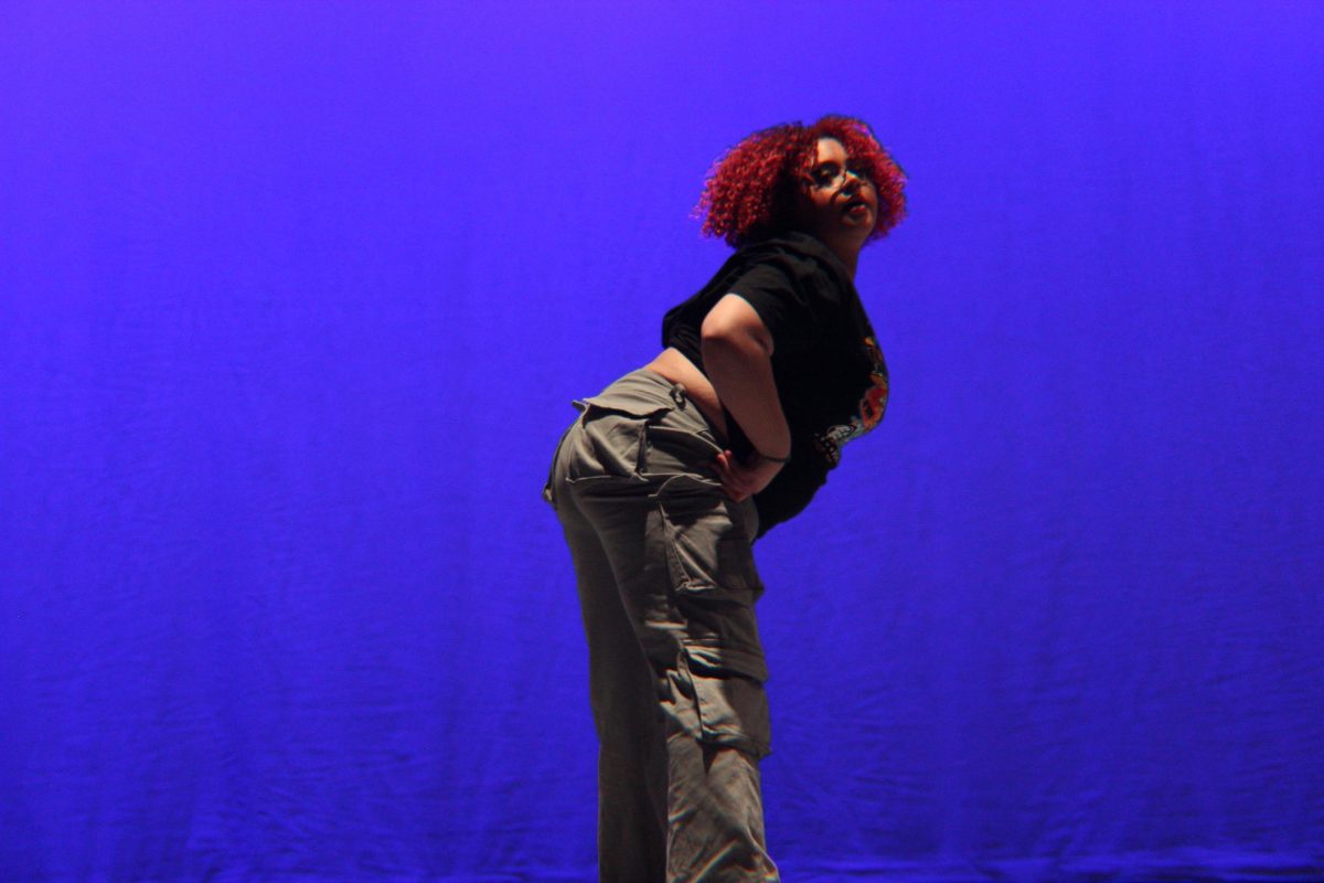 Senior Thinalee Cedeno Homs performs a solo in her group dance performance.
