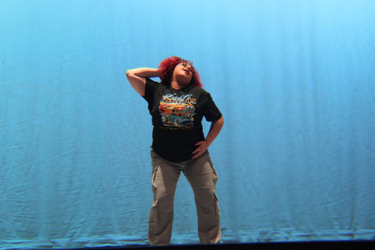 Senior Thinalee Cedeno Homs starts her solo with a pose.