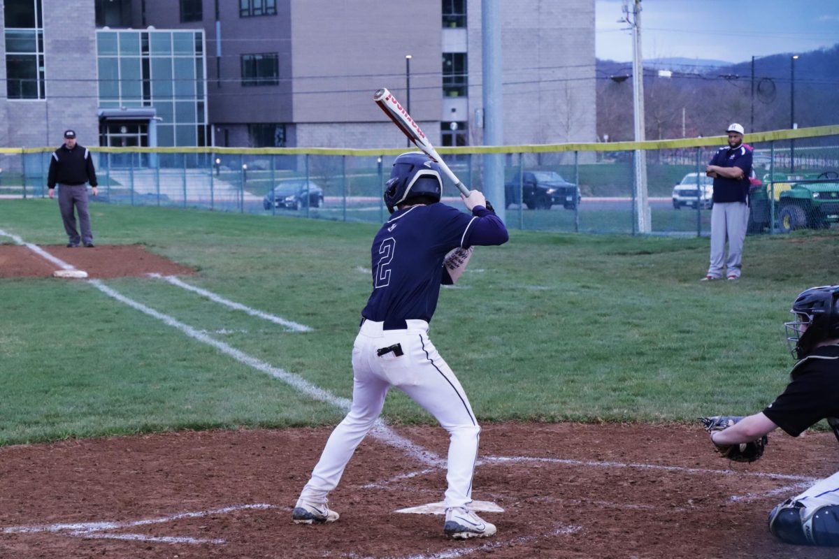 Senior Sawyer Hook gets into position to hit the ball.