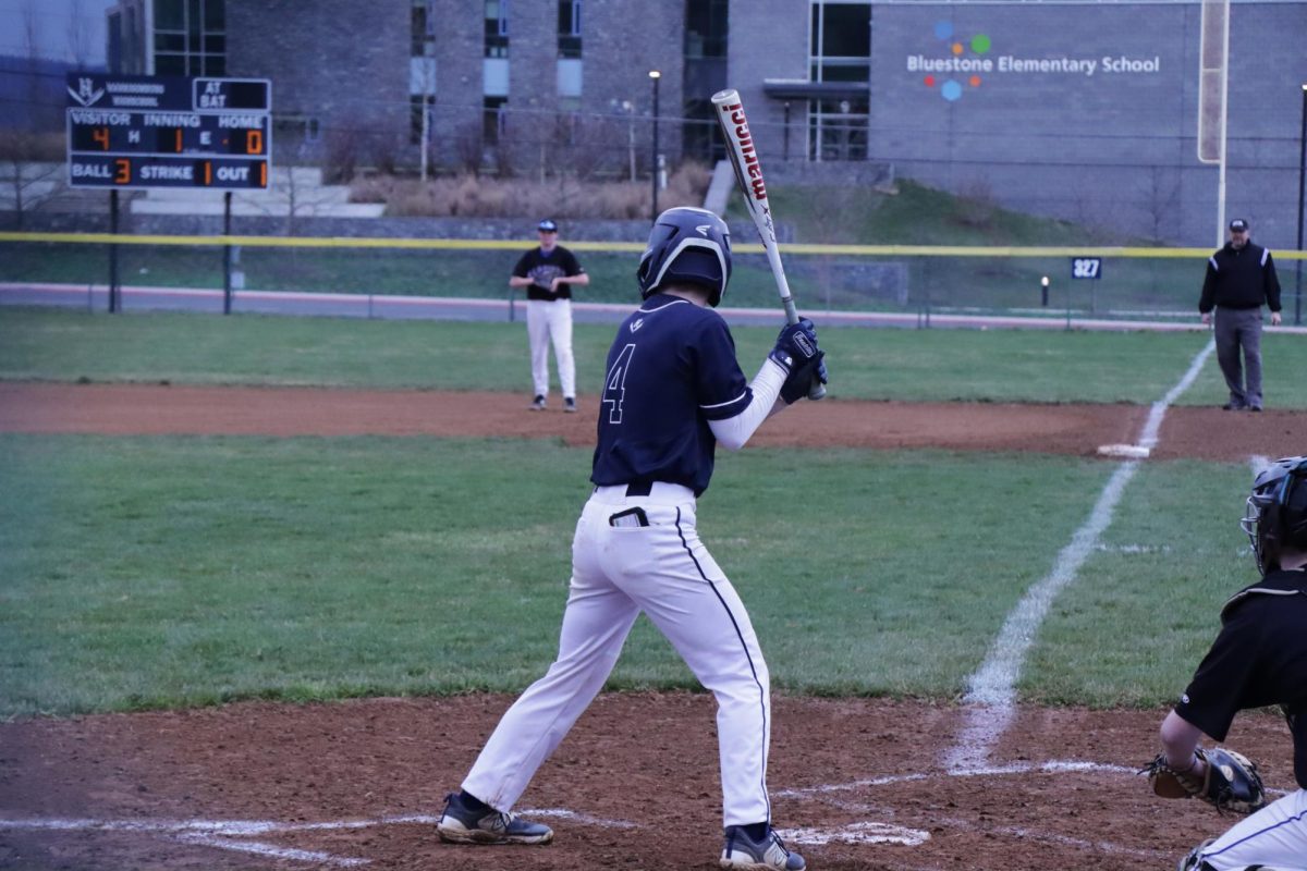 Junior Cayden Lucas prepares to swing.