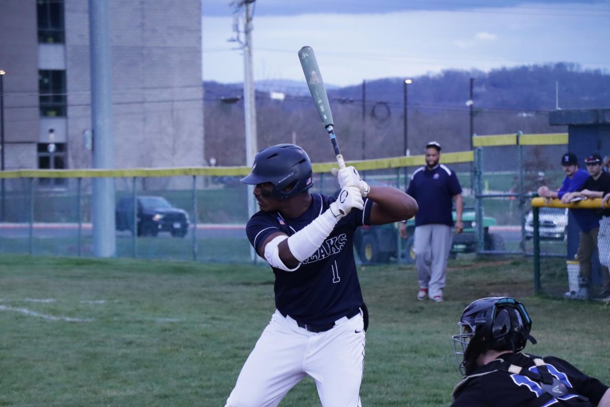 Senior Miguel Fajardo-Luis gets ready to hit the ball.